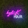 Hyd-K Hair Salon neon sign logo, from the salon's Instagram